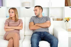 Young couple in quarrel at home